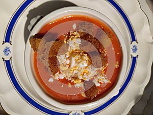 Tomato soup with croutons and boiled egg Andalusian Gazpacho typical spanish cold dish