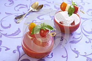 Tomato soup with mozzarella and basil