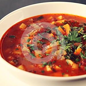 Tomato soup with red beans, potato and carrot.