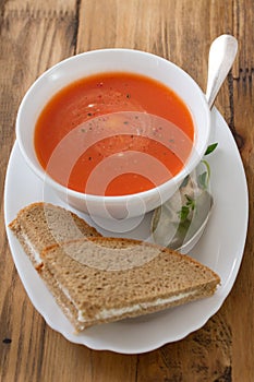 Tomato soup in white bowl