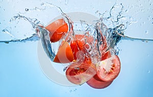 Tomato splash into the water