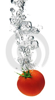 Tomato splashing in water