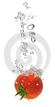 Tomato splashing in water