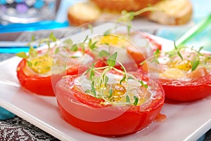 Tomato stuffed with quail egg