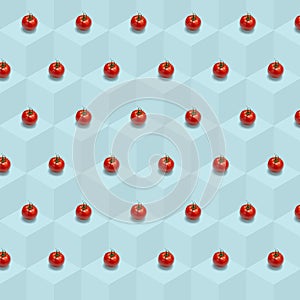 Tomato vegetable background, Isometric pattern photographed, Tomato`s on a light blue background, wrapping paper, postcard, wallpa