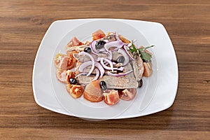 The tomato and ventresca salad is a fresh dish photo