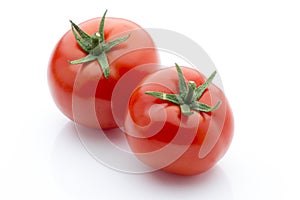 Tomato on the white isolatd background.