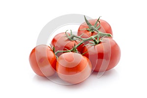 Tomato on the white isolatd background.