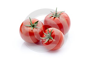 Tomato on the white isolatd background.