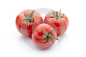 Tomato on the white isolatd background.