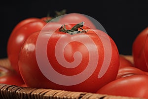 Tomatoes in basket closeup