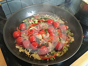 Tomatoes, beef, onion and spices pan fried