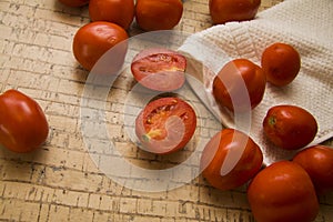 Tomatoes on beige background