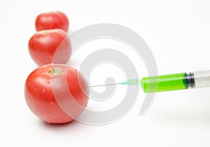 Tomatoes being injected