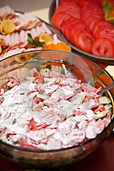 Tomatoes with cream salad in bowl