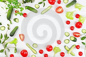 Tomatoes, cucumbers and parsley for cooking salad, Fresh summer vegetables on a bright sunny table with place for text, detox diet