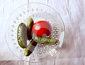 Tomatoes and cucumbers in a plate