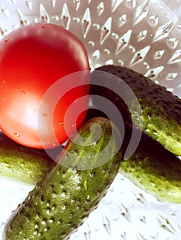 Tomatoes and cucumbers in a plate