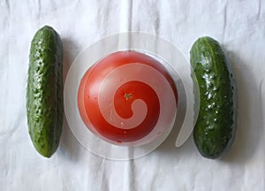 Tomatoes and cucumbers in a plate