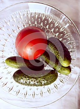 Tomatoes and cucumbers in a plate