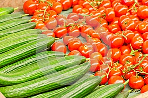 Tomatoes and cucumbers for sale