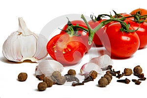 Tomatoes, garlic , cloves