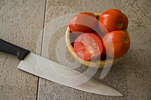 Tomatoes on grey background