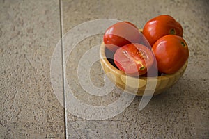 Tomatoes on grey background
