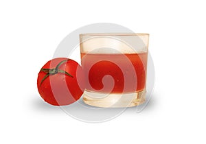 Tomatoes and juice in a glass