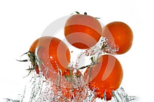 Tomatoes jumping out of the water