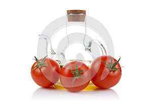Tomatoes and oilcan