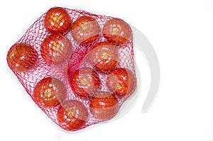 Tomatoes packaged in red plastic net