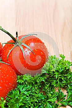 Tomatoes and parsley on countertop