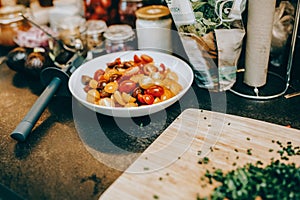 Tomatoes and parsley ready to be prepared