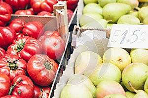 Tomatoes and pears in the fruit market, Catania, Sicily, Italy