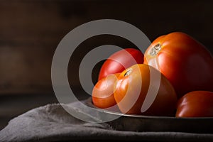 Tomatoes on a plate, edible berries