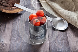 Tomatoes in a preserve tin