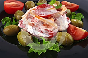 Tomatoes salad and olives