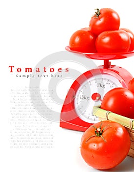 Tomatoes on scales and in a basket.