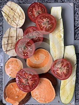 Tomatoes, sweet potatoes, Aubergine or eggplant and zucchini