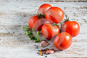 Tomatoes on the table of the kitchen.