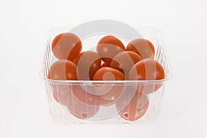 Tomatoes in transparent box
