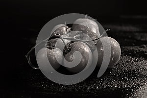 Tomatoes under water drops