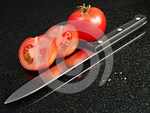 Tomatoes with vegetable knife
