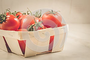 Tomatoes in a wattled container/tomatoes in a wattled container, selective focus