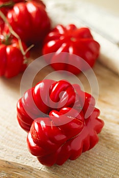 Tomatoes on a wooden background. Selectiv focus.