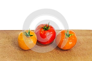 Tomatoes on the wooden board