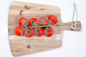 Tomatoes on wooden table