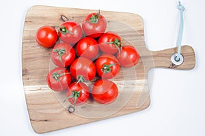 Tomatoes on wooden table