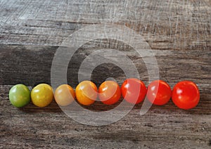 Tomatos on wooden background still life kitchen